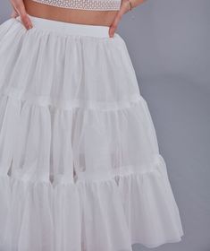 Step into elegance with our beautifully crafted voile petticoat. Designed to add volume and a touch of sophistication to any outfit, this petticoat is perfect for weddings, parties, or even everyday wear. The elastic band ensures a comfortable fit, accommodating up to 36 inches with ease. Made from lightweight and breathable voile, this petticoat provides the perfect amount of fluff without feeling bulky. Whether you're dressing up for a special occasion or looking to enhance your daily attire, Quinceanera Bouquet, Bouquet Holder, Hand Bouquet, Wedding Veil, Bridal Veil, Bridesmaid Bouquet, Petticoat, Quinceanera, Bridal Accessories