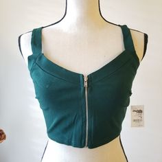 Cr Offers A Fashion-Forward Flair To Your Casual Style With The Dark Green Zip Front Tank. This Top Is Complete With Wide Fixed Straps, V Neckline, And A Cropped Fit. New With Tags! Bundle And Save! Spring Top With Zipper Closure For Night Out, Spring Night Out Tops With Zipper Closure, Spring Tops With Zipper Closure For Night Out, Green Casual Crop Top For Night Out, Spring Crop Top With Zipper For Night Out, Spring Crop Top With Zipper Closure For Night Out, Trendy Spring Crop Top With Zipper Closure, Casual Tops With Zipper Closure For Night Out, Summer Party Tops With Zipper Closure