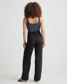 We call these ready-to-wear on repeat. Our Stretch Crepe Pleated Wide Leg Pants look totally tailored with front pleats and long, wide legs for a perfectly draped look. And, you'll love that the recycled poly-spandex blend keeps them relaxed and comfy, too. Dress them up with a blazer or keep them weekend casual with your favorite cashmere sweater.  | Quince | Women's Stretch Crepe Pleated Wide Leg Pants in Black, Size 4, Recycled Polyester Silk Pajamas Shorts, Pleated Wide Leg Pants, Everyday Pants, Fun Pants, Knit Blazer, Stretch Crepe, Silk Pajamas, Silk Skirt, Wide Legs