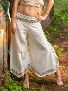 Product Type: Pants Materials: Cotton Dimensions: Free-size Colors/Patterns: Natural FEATURES - ♦Comfortable high-waisted cotton pants for waist sizes 28 to 36 inches ♦Versatile Rajasthani hand-blockprint designed trousers with flair at leg openings ♦Stylish natural-hued Zaria Pants with cultural richness and contemporary elegance ♦Fashionable bottom-flared cotton pants with Rajasthani hand-blockprint motifs ♦Graceful and comfortable high-waisted pants  Connect with us on Social Media  Facebook Bohemian Pants Outfit, Plazo Pants, Cotton Pants Women, Bohemian Pants, Boho Festival Fashion, Boho Trends, Boho Pants, Pants Cotton, Print Pants