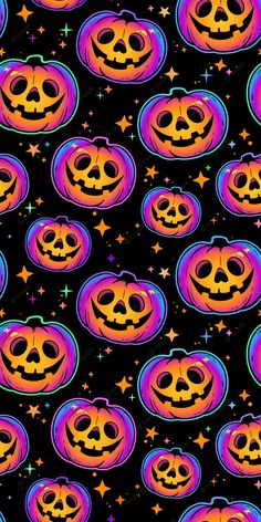 a lot of pumpkins that are on a black background with some stars around them