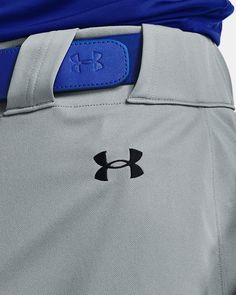 Lightweight, durable, performance fabric built for gameday comfort|Material wicks sweat & dries really fast|Wider waistband with belt loops, working fly & interior silicone print to help keep your jersey in place​|Open back pockets Functional Sports Bottoms With Elastic Waistband, Functional Moisture-wicking Bottoms For Golf, Functional Bottoms With Elastic Waistband For Sports, Sports Bottoms With Logo Waistband, Functional Bottoms For Sports Events, Under Armour Gray Sports Bottoms, Gray Under Armour Sports Bottoms, Silicone Print, Baseball Pants