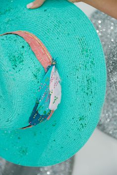 This JULEP SUN HAT will make you stand out in any crowd! Perfect for a day at the beach, this mint sun hat features a snake skin band, feathers, and a touch of glitter for a stylishly glamorous look. Keep the sun out of your eyes in style! This hat is one-of-a-kind, created by our owner Stephanie. This hat is ONE OF A KIND. To receive item quicker, expedited shipping is available at checkout. Green Adjustable Hat Bands For Kentucky Derby, Adjustable Green Hat Band For Kentucky Derby, Adjustable Green Hat Bands For Kentucky Derby, Green Straw Hat For Kentucky Derby Beach, Green Bohemian Hat Bands For Spring, Green Mini Beach Hat With Short Brim, Green Mini Hat With Short Brim For Beach, Beach Hats With Feathers And Wide Brim, Adjustable Green Mini Hats For Summer