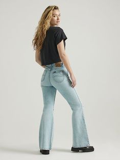 (Previously known as Vintage Modern High Rise Flare Jean) With enough extra flare-legged fabric to dress an entire decade, our High Rise Flare Jean isn't just a '70s throwback; it's the real deal. Rekindled from patterns in our archives, this high rise creates a beautifully trimmed waistline, followed by a snug-yet-comfortable fit in the seat and thighs and a 33" inseam length. With a wash inspired by a pair of archived bell bottoms, these look like they walked right outta Woodstock. Vintage Modern, Woodstock, Jeans Style, Bell Bottoms, Modern Vintage, Flare Jeans, Casual Pants, Comfort Fit, High Rise