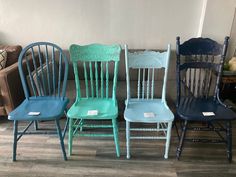 four chairs are lined up in a row