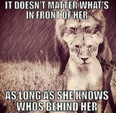 a lion with the caption behind it that reads, it doesn't matter what's in front of her long as she knows who's behind her