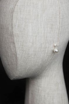 Modern, chic and sophisticated, the Ella pearl earrings will double the decadence with a large pearl drop suspended from a smaller pearl stud. * DETAILS * > Swarovski pearls, silver plated settings > Colours: Silver/ivory > Dimensions: 21mm * READY TO SHIP * The Ella earrings are ready to ship. Please allow 5-7 business days for processing plus delivery times. Please leave your wedding date and phone number for the postal slip in the message box at checkout. * IN A RUSH? * Rush orders a Minimalist Pearl White Pearl Drop Bridal Earrings, Minimalist Pearl White Bridal Earrings With Pearl Drop, Minimalist Pearl White Pearl Earrings For Wedding, Minimalist Pearl Drop Wedding Earrings, Minimalist Pearl Pendant Earrings For Wedding, Minimalist Wedding Pearl Drop Earrings, Akoya Pearl Drop Bridal Earrings For Wedding, Elegant Pearl White Pearl Earrings For Bridesmaid Gift, Elegant Pearl Drop Earrings For Bridesmaids