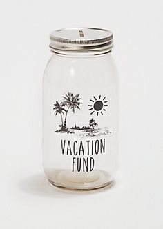 a glass jar with the words vacation fund on it and palm trees in the background