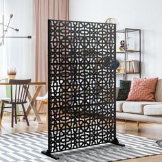 a room divider in the middle of a living room