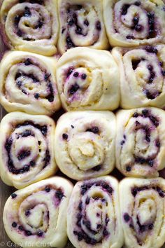 blueberry cinnamon rolls in a baking pan ready to be eaten