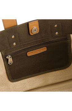 The iconic logo patch adds a well-traveled finish to a versatile canvas tote bag featuring a squared base for maximum interior space. 13 1/2" H x 18" W x 8" D 8" handle drop Magnetic top closure Dual top handles Interior has wall zip pocket Textile Lined Imported Brown Rectangular Canvas Bag For Travel, Functional Rectangular Satchel With Canvas Lining, Leather Travel Shoulder Bag With Reinforced Handles, Leather Shoulder Bag With Reinforced Handles For Travel, Brown Rectangular Duck Canvas Bag, Rectangular Brown Duck Canvas Bag, Brown Rectangular Canvas Bag With Luggage Sleeve, Brown Bag With Double Reinforced Handles, Brown Double Handle Bag With Reinforced Handles