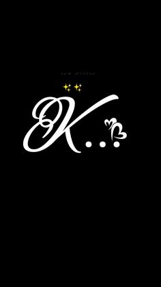 the letter k is written in cursive writing on a black background with stars