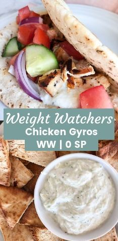 a white plate topped with chicken gyros next to tortilla chips and cucumber