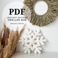 the crochet pattern is shown next to a snowflake ornament