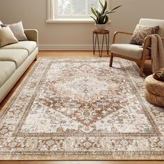 a living room with couches, chairs and rugs