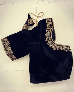 Hand embroidered ready made velvet saree blouse / crop top/stitched saree blouse usa / black saree blouse/ hand embroidered blouse/zardosi blouse/velvet saree blouse/ pure silk blouse/ black velvet maggam work blouse        It is very true that a perfect blouse is the one which makes your saree look stand out !! If you find one of such a style that you have been wanting to have then dont let it go !! we carry such unique trending blouses that instantly add a stylish look to any saree !!     Well..!! we understand that you may not get in your desired size/pattern, here you go with customization according to your size/pattern which we can deliver in 1-2 weeks of time period !!      Here is a beautiful pure velvet Hand embroidered saree blouse in black color that has heavy intricate embossed Black Bollywood Blouse With Intricate Embroidery, Elegant Unstitched Velvet Blouse Piece, Unstitched Velvet Saree Blouse Piece, Velvet Unstitched Blouse For Wedding, Embroidered Velvet Fitted Choli, Unstitched Velvet Blouse For Party, Party Velvet Saree With Resham Embroidery, Black Velvet Blouse For Party, Black Velvet Party Blouse