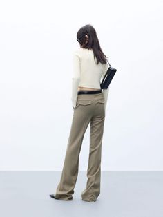 MO&Co. Women's High Waist Tailored Pants Feel confident and stylish with these tailored pants. Crafted from pure wool, with a straight-leg cut and a flattering drape, these pants feature a zip, hook and button closure as well as side pockets. Elevate your look with the perfect blend of sophistication and chic – pair them with a shorter top for a truly unique and fashionable ensemble. Features : - Straight cut with slightly wide hems- Zipper, hook and button closure- Double side pocket design Cod Fitted Wool Wide Leg Pants For Fall, Fall Wide-leg Pants With Pressed Crease, Business Pants For Fall, Fall Business Wide-leg Pants, Chic Wool Bottoms For Fall, Office Pants For Fall Full Length, Straight Wool Pants For Office, Tailored Wide-leg Dress Pants For Fall, Business Wide-leg Dress Pants For Fall