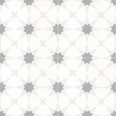 a white and gray tile pattern with circles