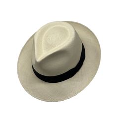 The quintessential Panama hat is the epitome of style and elegance. Long time ago this Masterpiece was a men’s hat now its for anyone that wants to look in style. El Galpon's tribute to the Spanish Caribbean & Puerto Rican Hat tradition. Handmade in Ecuador, designed in Puerto Rico. Super Fine Panama hat Grade 11/12 Labor Time 35 days Leaves per square inch 23-24 --- El sombrero de Panamá por excelencia es el epitome de estilo y elegancia. Hace mucho tiempo, esta Obra Maestra era un sombrero Classic Solid Fedora With Curved Brim, Classic Fitted Fedora For Travel, Elegant Fitted Hats For Travel, Classic Flat Brim Fedora For Travel, Classic Wide Brim Solid Color Hat, Classic Wide Brim Hat In Solid Color, Elegant Fedora With Curved Brim For Travel, Elegant Curved Brim Fedora For Travel, Elegant Travel Fedora With Curved Brim