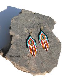 Native American Indian earrings Huichol earrings Black turquoise red Indian beaded Beaded earrings Indian jewelry Colorful earrings Short earrings American earrings Multicolored earring Fringe earrings Navajo earrings 3 inch colorful beaded earrings in American Indian style. These earrings are not authentic Native American earrings, but are made according to my author's design. I was inspired to create these earrings by the bright and colorful culture of the Indians of North and South America. C Southwestern Style Beaded Dangle Jewelry, Southwestern Style Colorful Beads Dangle Jewelry, Southwestern Style Beaded Dangle Earrings, Southwestern Red Dangle Earrings, Southwestern Beaded Dangle Earrings, Red Southwestern Dangle Earrings, Southwestern Style Beaded Drop Earrings, Southwestern Style Red Dangle Earrings, Southwestern Style Dangle Jewelry With Colorful Beads