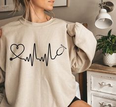 Nursing School Sweatshirt Ideas, Nurse Tshirt Designs, Medical Shirts Design, Nurse Cricut Ideas, Nurse Shirts Vinyl, Nurse T Shirts Ideas, Nurse Shirts Ideas, Nurse Barbie