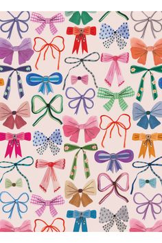 many different colored bows on a white background