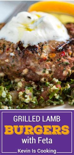 grilled lamb burgers with feta, kale and sour cream on top