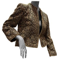 A stunning 1980s Bill Blass evening jacket of traditional Indian inspiration. Heavily encrusted all over with chain embroidery gold work. Imported fabric. Gold roping at hems and cuffs. Fully lined with hook and eye closures. Luxury Gold Outerwear For Evening, Elegant Silk Outerwear With Zari Work, Elegant Fall Outerwear With Zari Work, Luxury Festive Evening Outerwear, Fitted Party Outerwear With Gold Embroidery, Elegant Silk Outerwear With Intricate Embroidery, Festive Party Outerwear With Gold Embroidery, Gold Embellished Outerwear For Formal Occasions, Formal Gold Brocade Outerwear