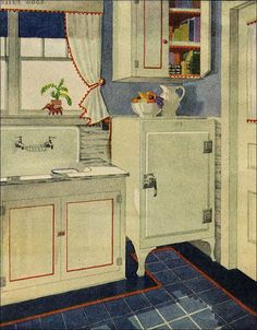 an old fashioned kitchen with blue tile flooring and white cupboards on the wall