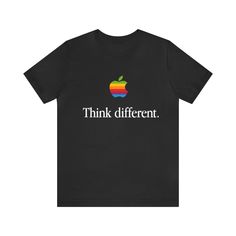 an apple t - shirt with the words think different in white letters on black background