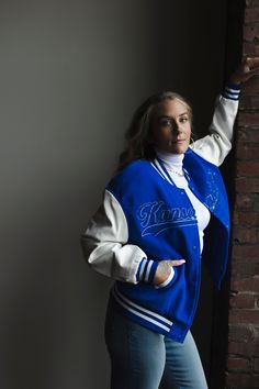 Show your city pride in style with this Kansas City letterman bomber jacket. Crafted with durable material, this jacket is built to last and proudly displays the iconic Kansas City logo. Show your love for the city today! Model is 5’7 wearing a medium unisex Royal Blue Collegiate Long Sleeve Varsity Jacket With Letter Patch, Collegiate Long Sleeve Varsity Jacket For Campus, Urban Outerwear For Game Day In Fall, Blue Sporty Outerwear For Game Day, Urban Style Outerwear For Game Day In Fall, Urban Varsity Jacket For Game Day In Fall, Collegiate Track Jacket For Game Day, Collegiate Winter Track Jacket For Game Day, Collegiate Style Track Jacket For Game Day In Winter