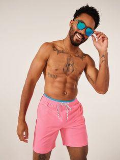 Grab your sunglasses and your flamingo floaty and sink into island time with these classic swimmers. These jealousy-inducing trunks feature an ultra quick drying shell, mesh basket liner and a zipper back pocket. Not to mention the elastic waistband and build-in drawstring designed to keep your trunks secure from the swim up bar all the way to the all you can eat crab leg buffet. Fabric: 92% Polyester/8% Spandex Machine Wash Cold, Tumble Dry Low Best for: Swimming, Sunbathing, Boat Days, Boogie Stretch Nylon Swim Trunks With Upf 50+, Solid Color Moisture-wicking Nylon Swim Trunks, Sports Nylon Swim Trunks With 4-way Stretch, Functional Nylon Swim Trunks With 4-way Stretch, Roundhouse Kick, 4-way Stretch Nylon Swim Trunks, Swim Up Bar, Polyester Spandex, Swim Trunks