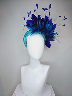 From the 2024 Featured Milliner of the Kentucky Derby Museum  Gorgeous Kentucky Derby hat fascinator  kentucky derby hat fascinator aqua blue swarovski crystal headband with navy blue spike feather and large navy royal blue feathers headband attachment each hat is totally one of a kind! no two are alike! I can probably add feathers, flowers etc to existing hats for a small fee. I cannot remove anything from existing hats. Just message me and see if we can make it work! :) I cannot make custom or Blue Feathered Costume Hats For Royal Ascot, Fitted Blue Costume Hat With Feathers, Blue Feather Headpiece For Kentucky Derby, Luxury Blue Headpieces For Races, Blue Party Costume Hats And Headpieces With Feathers, Blue Feathered Headpiece For Kentucky Derby, Blue Party Costume Hat With Feather Trim, Blue Feather Trim Headpiece For Kentucky Derby, Blue Headpieces For Carnival