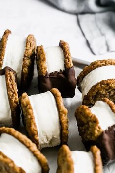 cookies and marshmallows are arranged on a plate