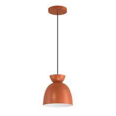 an orange pendant light hanging from a ceiling