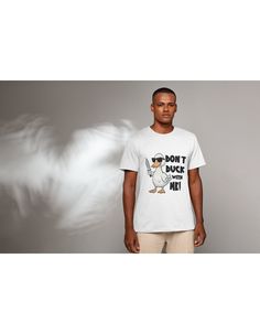 Take a chance and add some edge to your wardrobe with our Men's T-Shirt - Don't Duck With Me. This playful design features a cool duck graphic, complete with a knife and sunglasses. Perfect for those days when you're ready to take on the world (or the pond) with a little attitude. White Cotton Sublimation T-shirt With Funny Print, Novelty T-shirt With Screen Print For Summer, Funny White Shirt With Graphic Print, Casual Cotton Sublimation T-shirt With Funny Print, Novelty Screen Print T-shirt For Summer, Casual Cotton Sublimation Design With Funny Print, White Novelty T-shirt With Letter Print, Novelty White T-shirt For Streetwear, White Novelty T-shirt For Streetwear