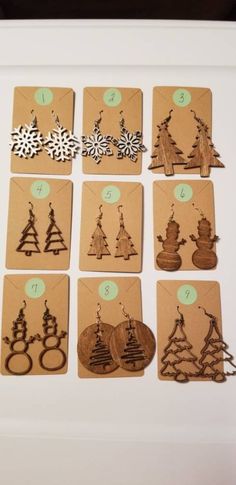 "Laser cut wood Christmas holiday earrings. Choose the pair you would like by coordinating number. Listing is for one pair. Sizes range from 1.25\" to 2\" Each style varies. Please message with any questions on sizes ." Wooden Laser Cut Ideas, Wood Christmas Earrings, Laser Cut Christmas Ideas, Earrings Wood, Christmas Wood Earrings, Glowforge Projects Ideas, Laser Cut Christmas Earrings, Glowforge Christmas Earrings, Wood Laser Cut Ideas