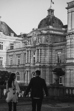 black and white photo of the couple holding hands in Paris Photoshoot Idea