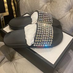 Brand New Gucci Crystal Embellished Slide Sandals In Box / Dust Bag Never Worn. Beautiful And Elegant And Will Brighten Up Any Outfit. Beautiful On The Foot And Will Turn Heads When You Step Out Designer Round Toe Sandals With Rhinestones, Designer Sandals With Rhinestones And Round Toe, Designer Rhinestone Sandals With Round Toe, Designer Black Sandals With Rhinestones, Designer Embellished Flat Sandals, Designer Black Embellished Sandals, Black Gucci Slides, Gucci Bloom Slides, Gucci Flip Flops