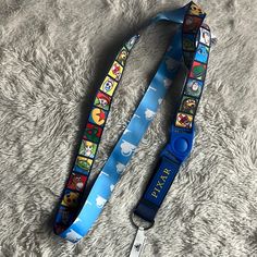 a lanyard strap with cartoon characters on it