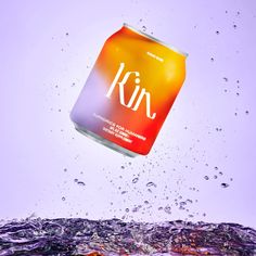 a can of kix in the air above water