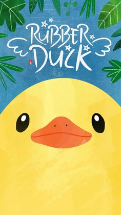 a yellow duck with leaves around it's neck and the words rubber ducks on its forehead