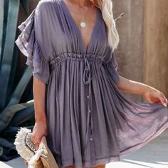 This Beautiful Dress Features A Lavender Color With A Lightweight Fabric. It Has Pockets And Faux Buttons Up The Front And An Adjustable Tie For The Waist And Neck Wardrobe Wishlist, Lavender Dresses, Short Sleeve Mini Dress, Lined Skirt, Flutter Sleeve Dress, Floral Print Shorts, Flutter Sleeves, Event Dresses, Batwing Sleeve