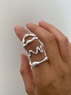 925 Sterling silver bone like ring.  Stunning statement ring and made to never be taken off.  Adjustable back but size is more of a 6 - 7.5 But the back can be pushed together to be made smaller.  We do recommend that all jewellery is taken off before showering, swimming and any harsh chemicals it might come in contact with to extend the rings life to its max. Asymmetric Ring, Trendy Irregular Silver Jewelry, Chunky Silver Jewelry, Trendy Irregular Shaped Metal Jewelry, Modern Adjustable Rings With Irregular Shape, Silver Clay Ring, Trendy Irregular Silver Ring, Strange Rings, Adjustable Silver Novelty Ring