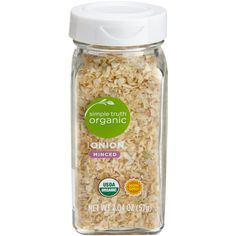 an open jar filled with oatmeal on a white background