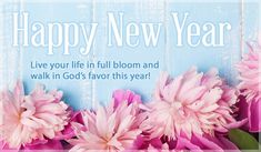 some pink flowers are in front of a blue background with the words happy new year