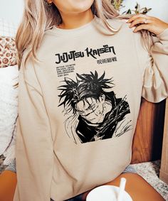 This  Choso - Jujutsu kaisen anime sweathsirt is the perfect anime lover and jujutsu kaisen gift. It can be a gift for him or a gift for her. Everyone needs a cozy go-to sweathsirt to curl up in, so go for one that's soft, smooth, and stylish. It's the perfect choice for cooler evenings! Each sweathsirt is carefully printed with a hand-drawn illustration and will withstand many washings. To make you feel extra comfy we only use super soft hoodie made from clouds and kissed by baby seals 🦭💋. + Perfect Gift 🎁: Whether you're thinking of a gift for him or her, this Choso - Jujutsu Kaisen sweathsirt is sure to charm any anime lover. Gifting made easy! -- FEATURES: + Long-lasting Quality 🧶: 50% pre-shrunk cotton, 50% polyester. Air-jet spun yarn with a soft feel and reduced pilling. + Haraj Choso Jujutsu Kaisen, Choso Jujutsu, Jujutsu Kaisen Anime, Baby Seal, Art Shirt, Japanese Streetwear, Anime Gifts, Soft Hoodie, Anime Aesthetic