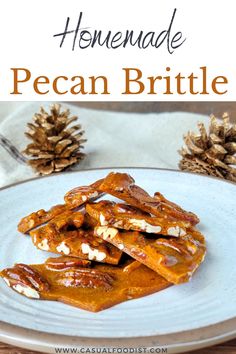 homemade pecan brittle on a plate with pine cones