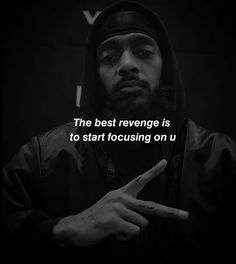 a man in a hoodie pointing to the side with a quote above him that reads, the best reverse is to start focusing on u