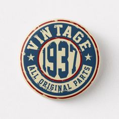 a button with the words win tage all original parts printed on it and an american flag